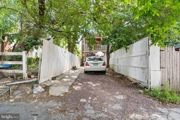 a view of a back yard of the house