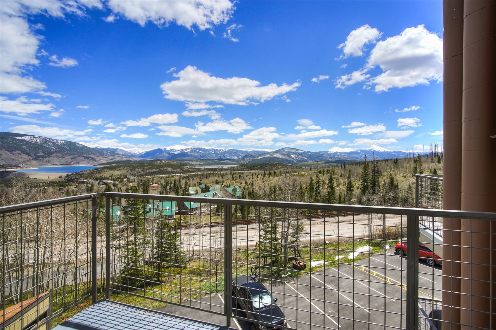7031 Ryan Gulch Road, Unit 301 Silverthorne, CO 80498 - Photo 22 of 37 a view of a lake from a balcony