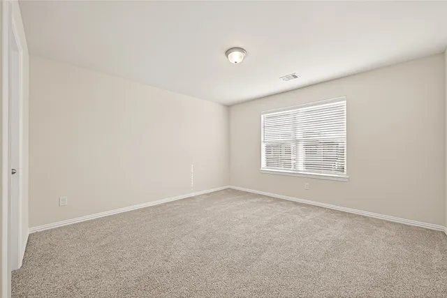 a bathroom with a double vanity sink toilet mirror and shower