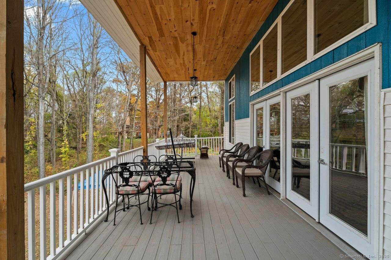 8 Tom Road East Haddam, CT 06423 - Photo 20 of 26 a view of a chairs and table in the balcony