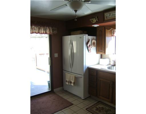 10050 Rinaman Road Wexford, PA 15090 - Photo 7 of 18 Kitchen. The Sliding Glass Doors Opens to the Covered Patio for Ease of Entertaining.