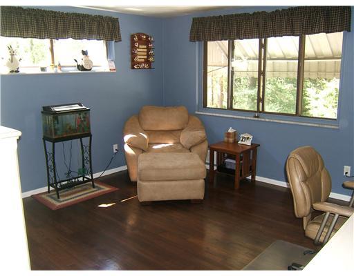 10050 Rinaman Road Wexford, PA 15090 - Photo 8 of 18 Living Room. The Living Room Boasts Refinished Hardwood Floors, a New Light FIxture and Natural Sunlight.
