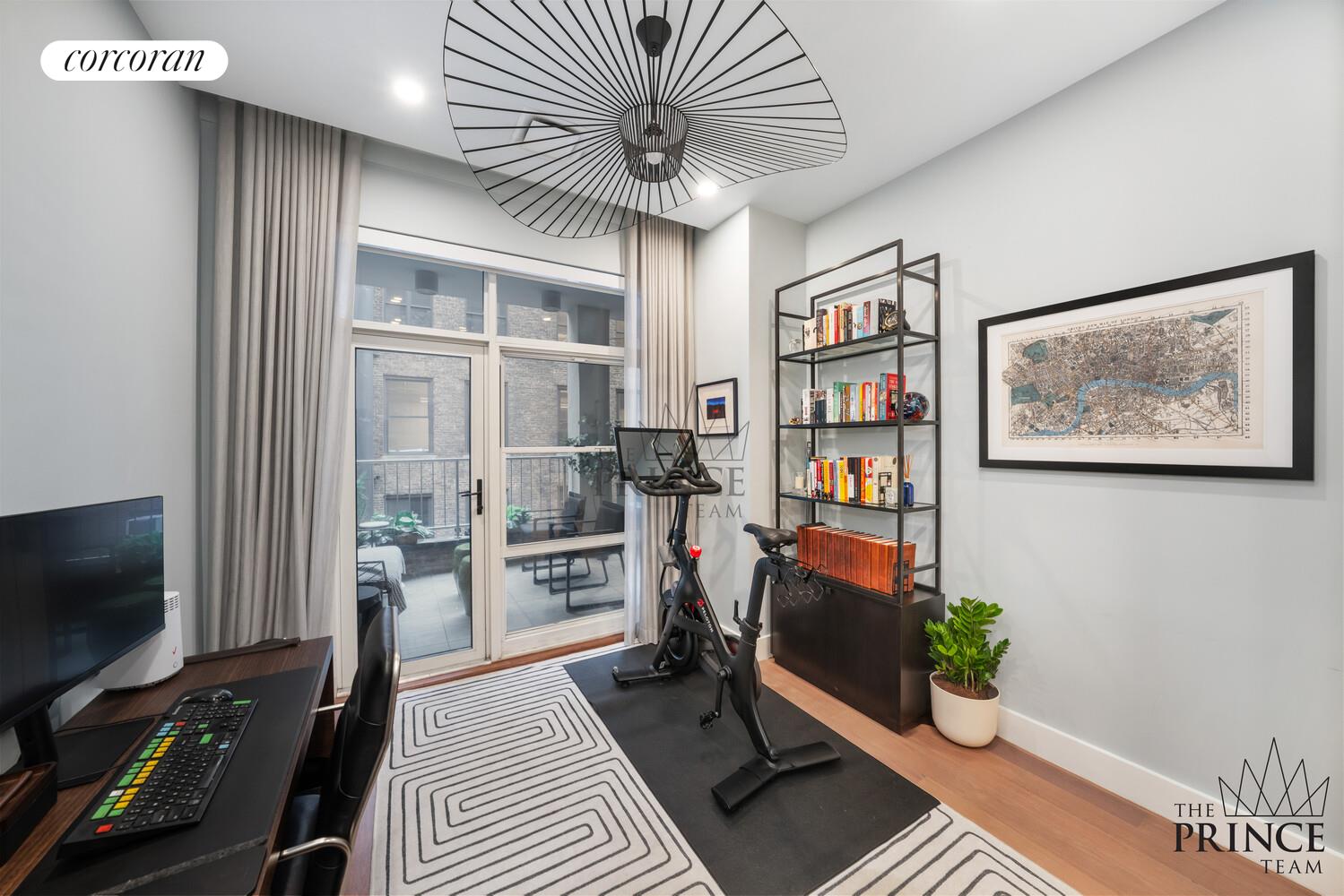 159 Madison Avenue, Unit 10ABC Manhattan, NY 10016 - Photo 18 of 20 a living room with furniture and a flat screen tv