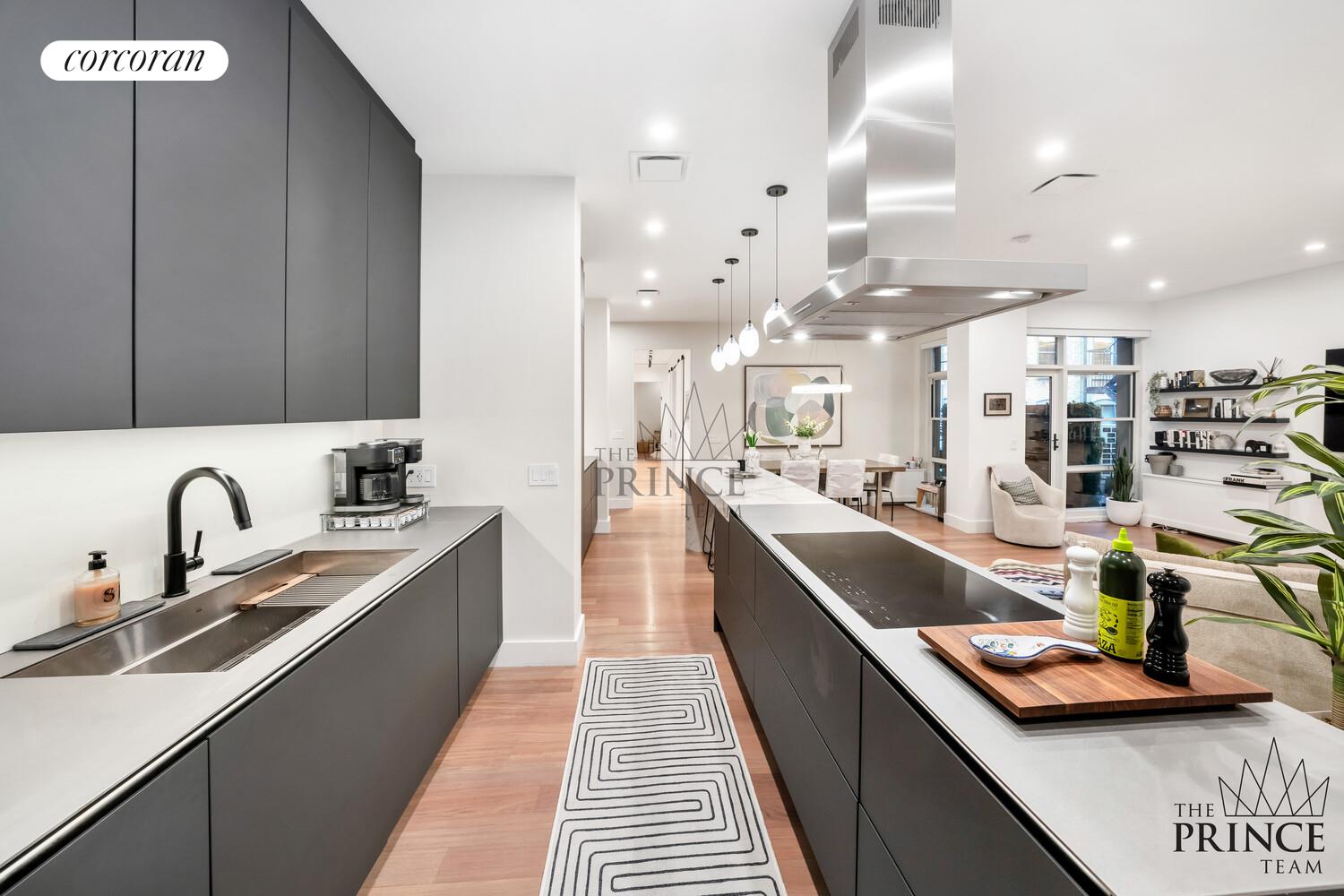 159 Madison Avenue, Unit 10ABC Manhattan, NY 10016 - Photo 3 of 20 a large kitchen with stainless steel appliances lots of counter top space