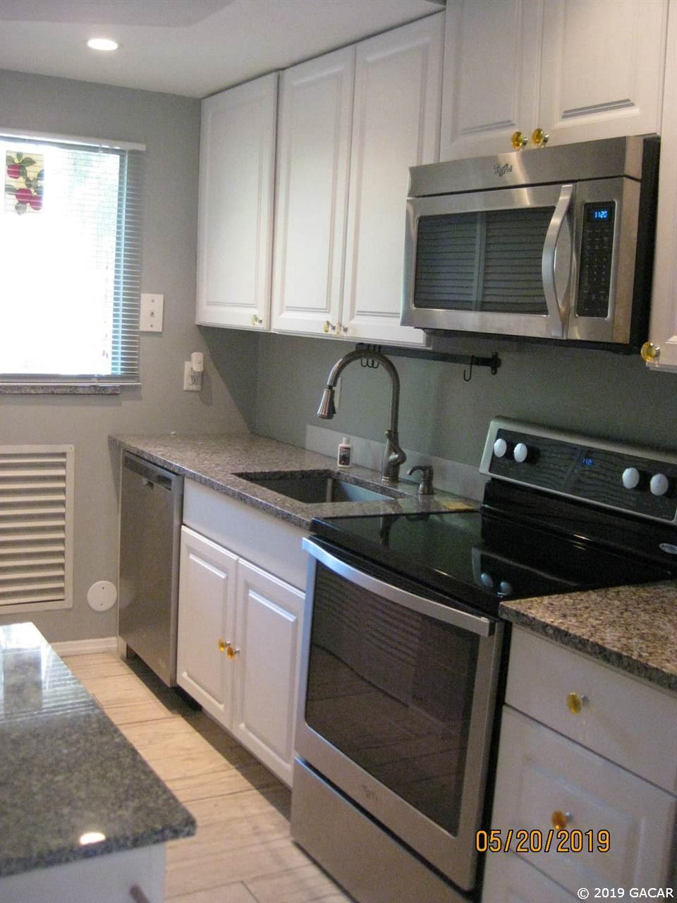 703 Southwest 75th Street, Unit 101 Gainesville, FL 32607 - Photo 1 of 13
