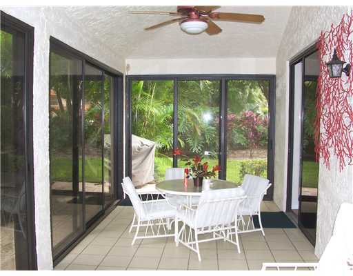 7727 La Mirada Drive, Unit 118 Boca Raton, FL 33433 - Photo 13 of 16 a view of a dining room with furniture window and outside view