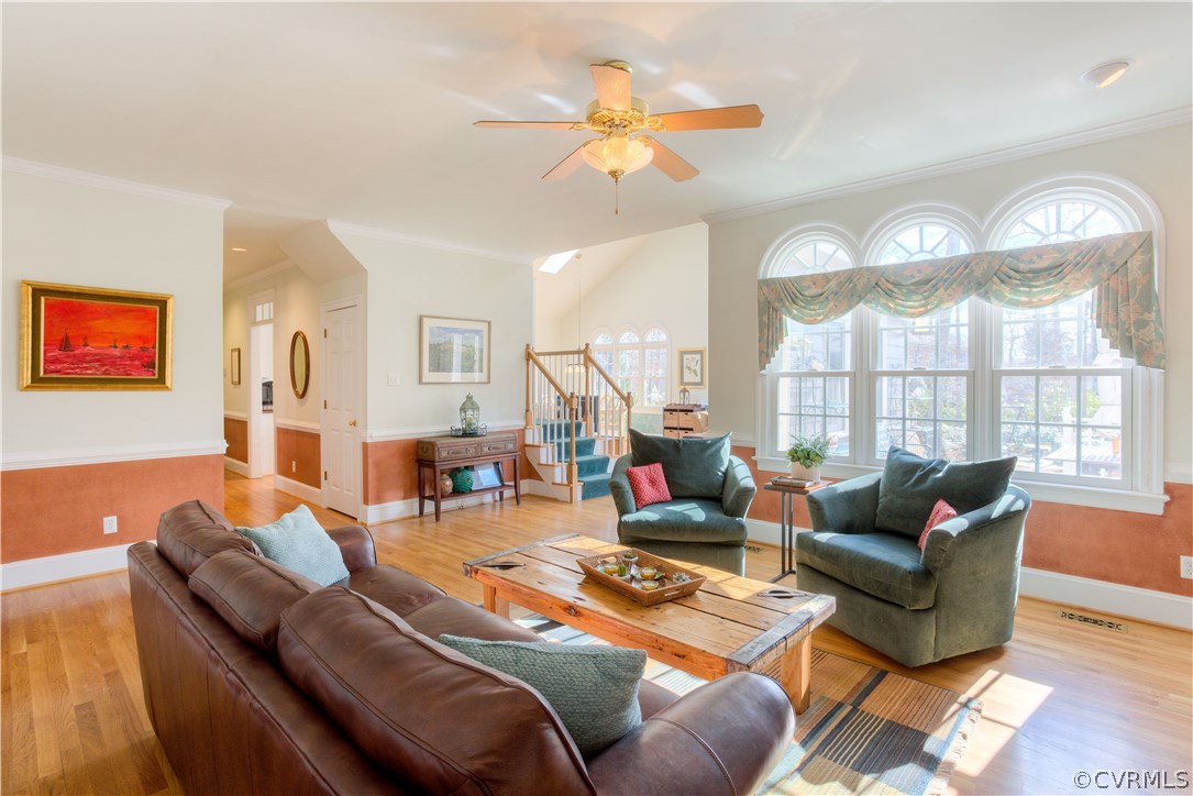 14411 Newgate Road Midlothian, VA 23113 - Photo 11 of 38 a living room with furniture and a large window