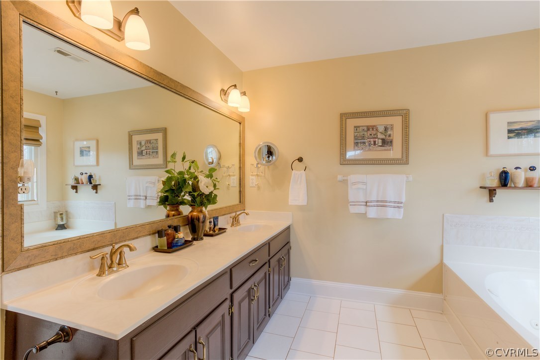 14411 Newgate Road Midlothian, VA 23113 - Photo 23 of 38 a bathroom with a sink double vanity