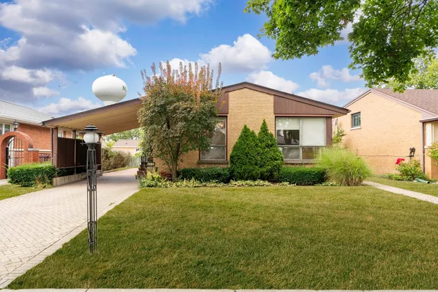 a house view with a garden space