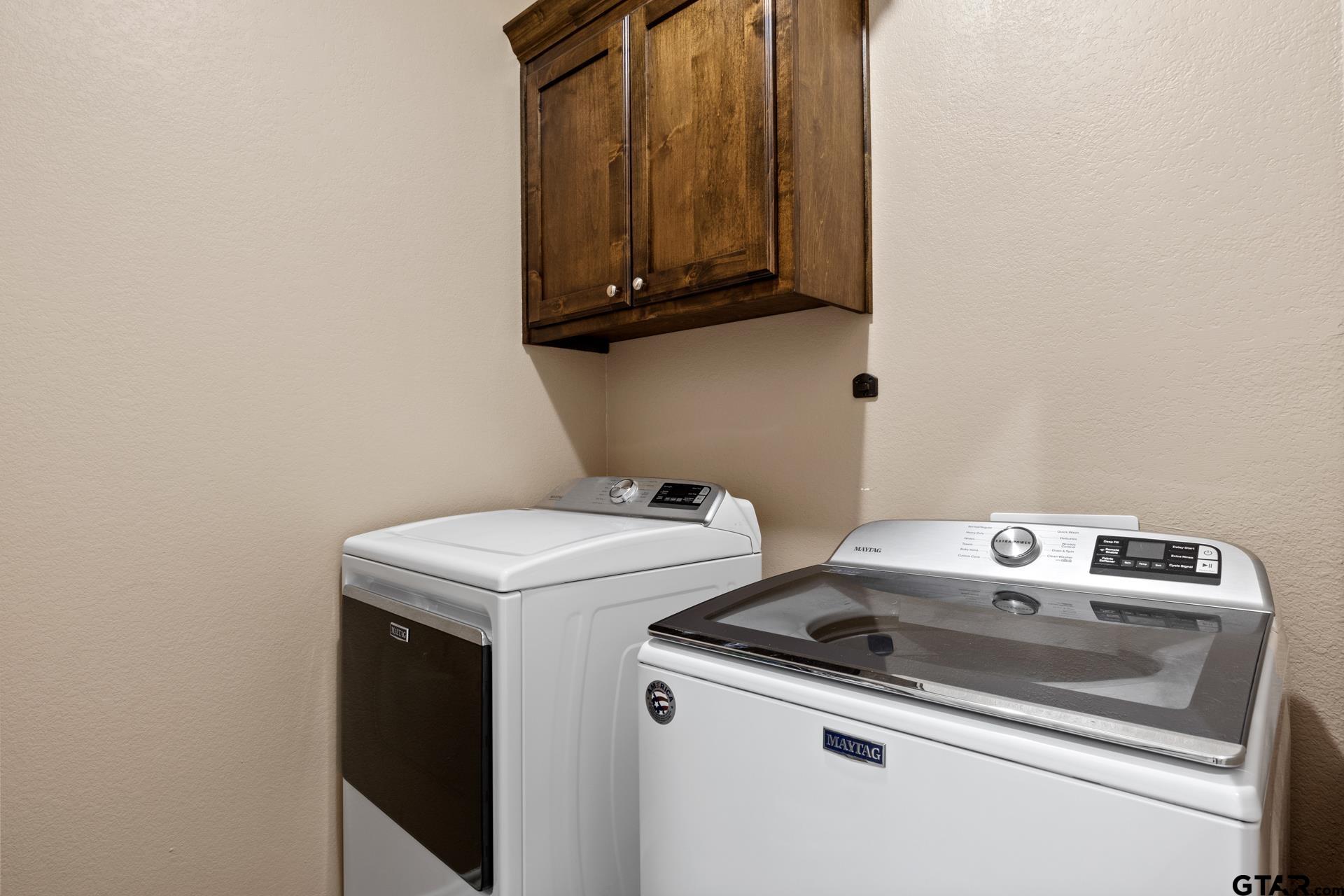 25 Private Road Pittsburg, TX 75686 - Photo 17 of 29 a utility room with dryer and washer