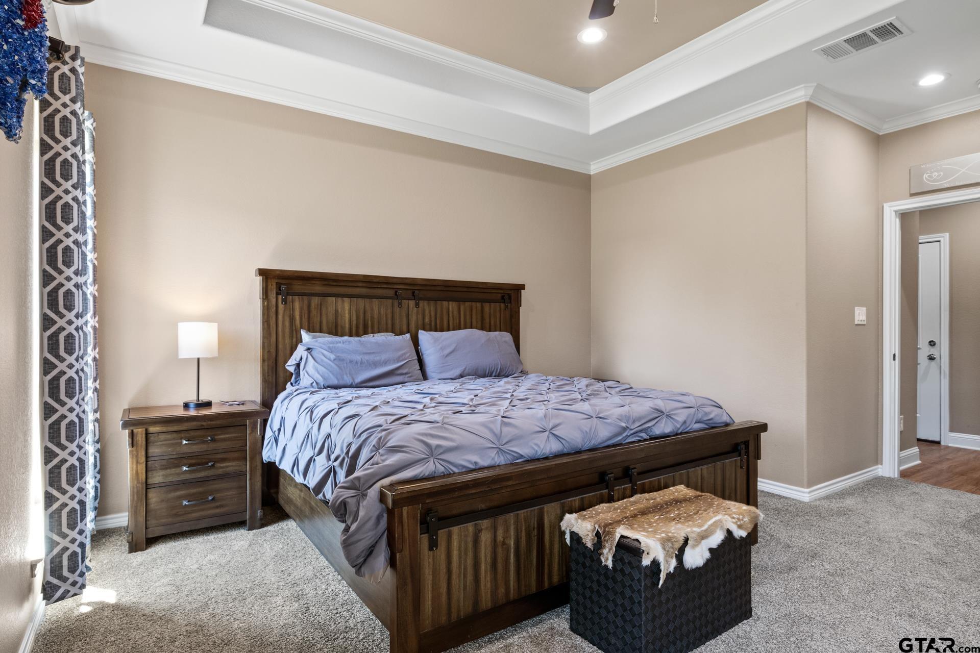 25 Private Road Pittsburg, TX 75686 - Photo 19 of 29 a bedroom with a bed and a closet