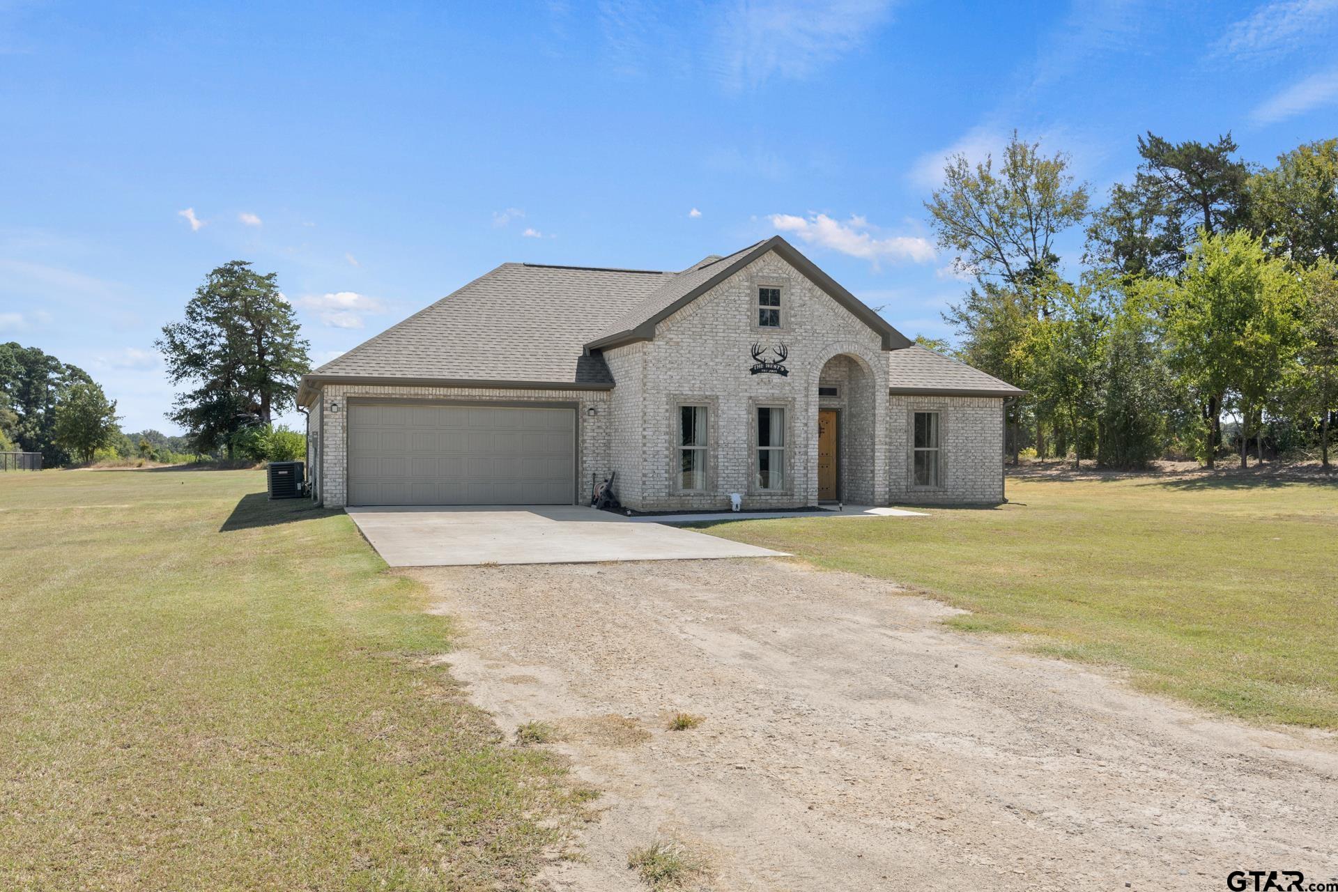 25 Private Road Pittsburg, TX 75686 - Photo 2 of 29 a view of outdoor space yard and front view of a house