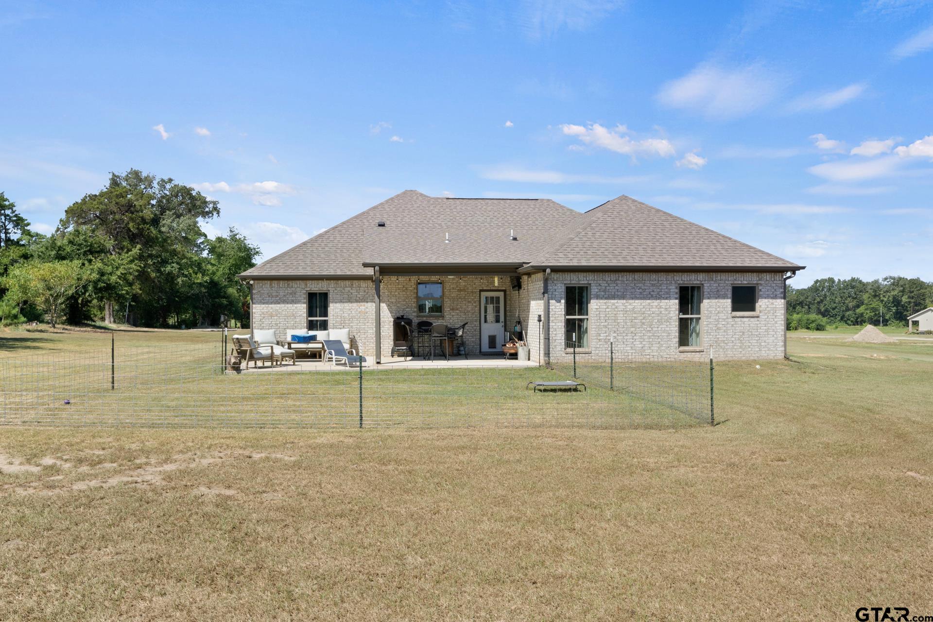 25 Private Road Pittsburg, TX 75686 - Photo 28 of 29 a house view with a garden space
