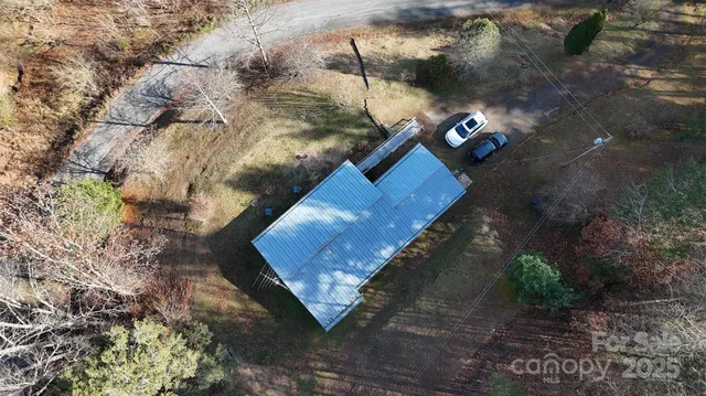 a kitchen with refrigerator and stove