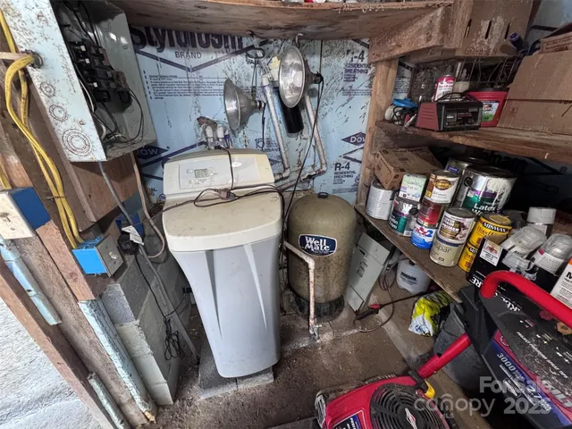 a view of a couches and a table in the backyard