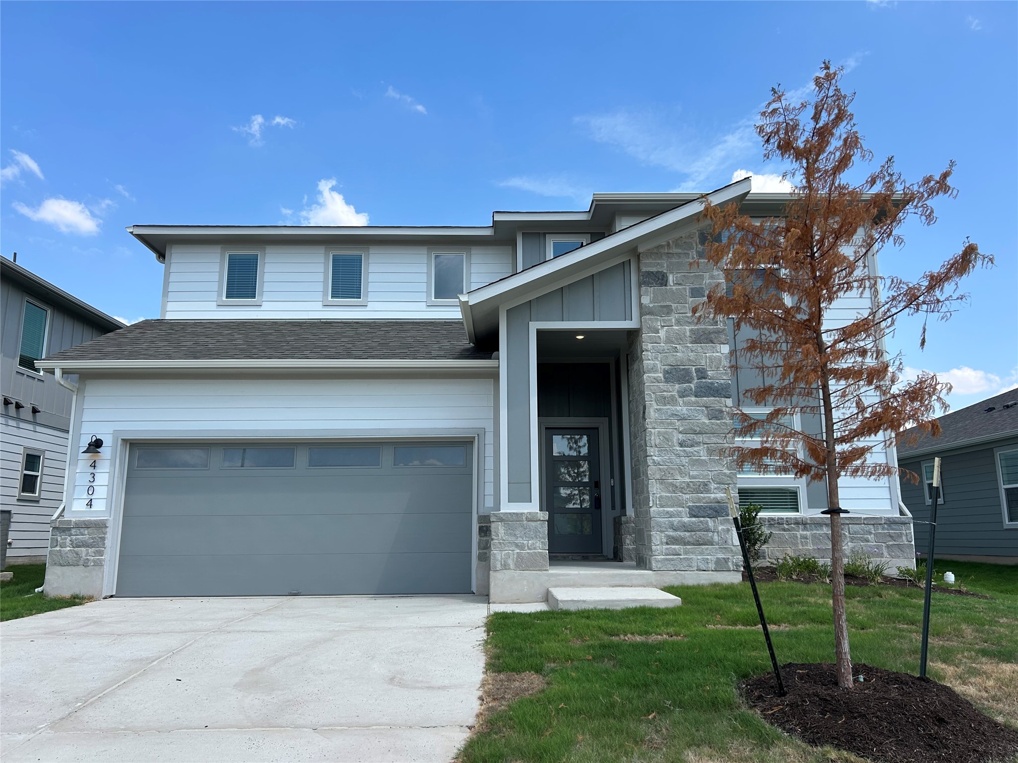 4304 Forel Road Pflugerville, TX 78660 - Photo 2 of 10 a front view of a house with garden