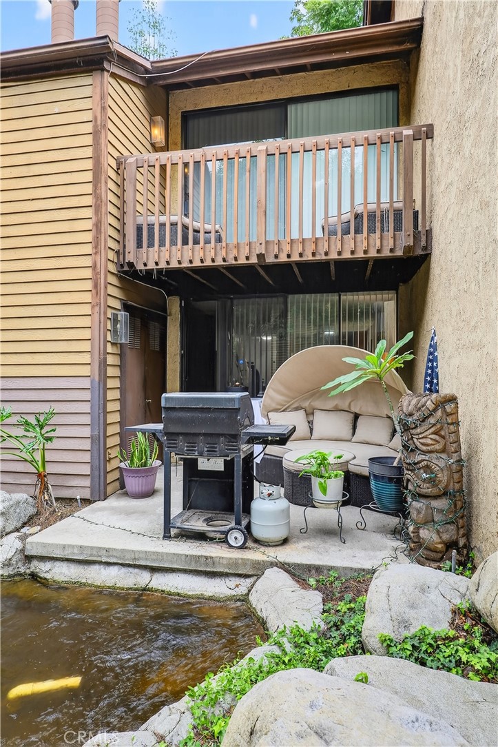 4140 Workman Mill Road, Unit 26 Whittier, CA 90601 - Photo 11 of 30 a patio with table and chairs