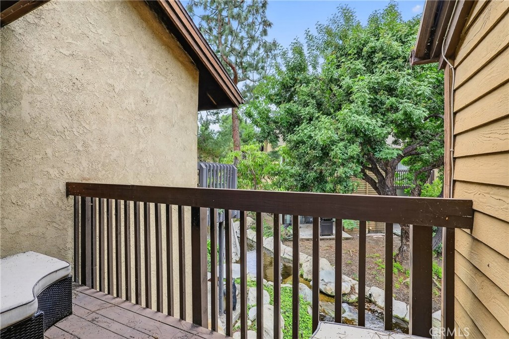4140 Workman Mill Road, Unit 26 Whittier, CA 90601 - Photo 14 of 30 a view of a balcony with wooden floor