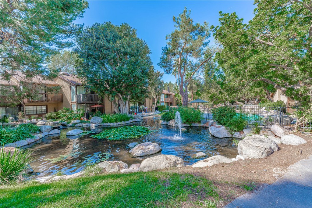 4140 Workman Mill Road, Unit 26 Whittier, CA 90601 - Photo 21 of 30 a view of a patio with furniture and garden