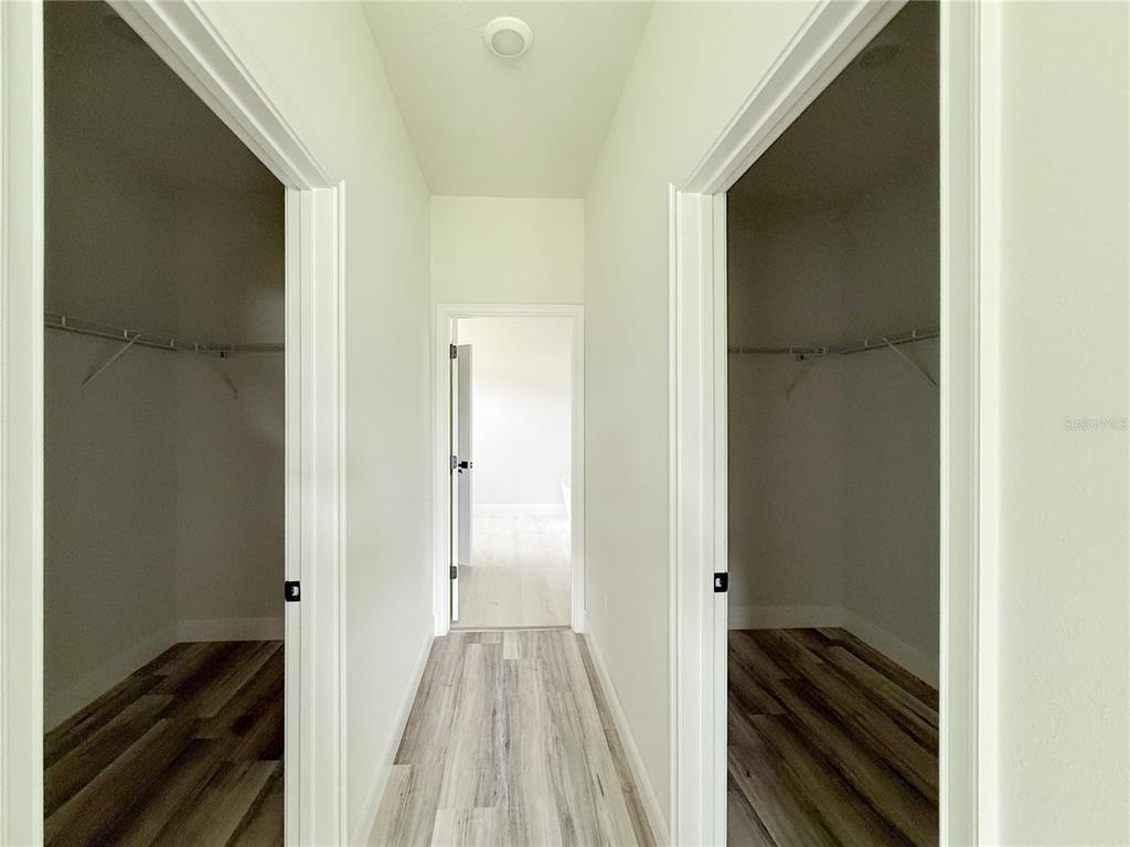 15716 Southwest 46th Ave Road Ocala, FL 34473 - Photo 24 of 31 a view of a bedroom from a hallway