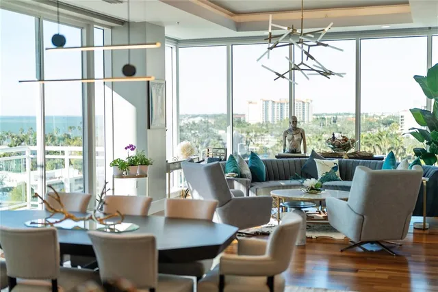 a bathroom with a glass shower door and a bathtub