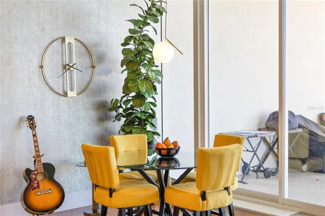a view of a hallway view with floor to ceiling window and wooden floor