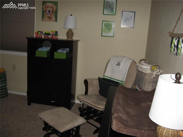 2050 Wickes Road Colorado Springs, CO 80919 - Photo 19 of 30 Upper Bedroom