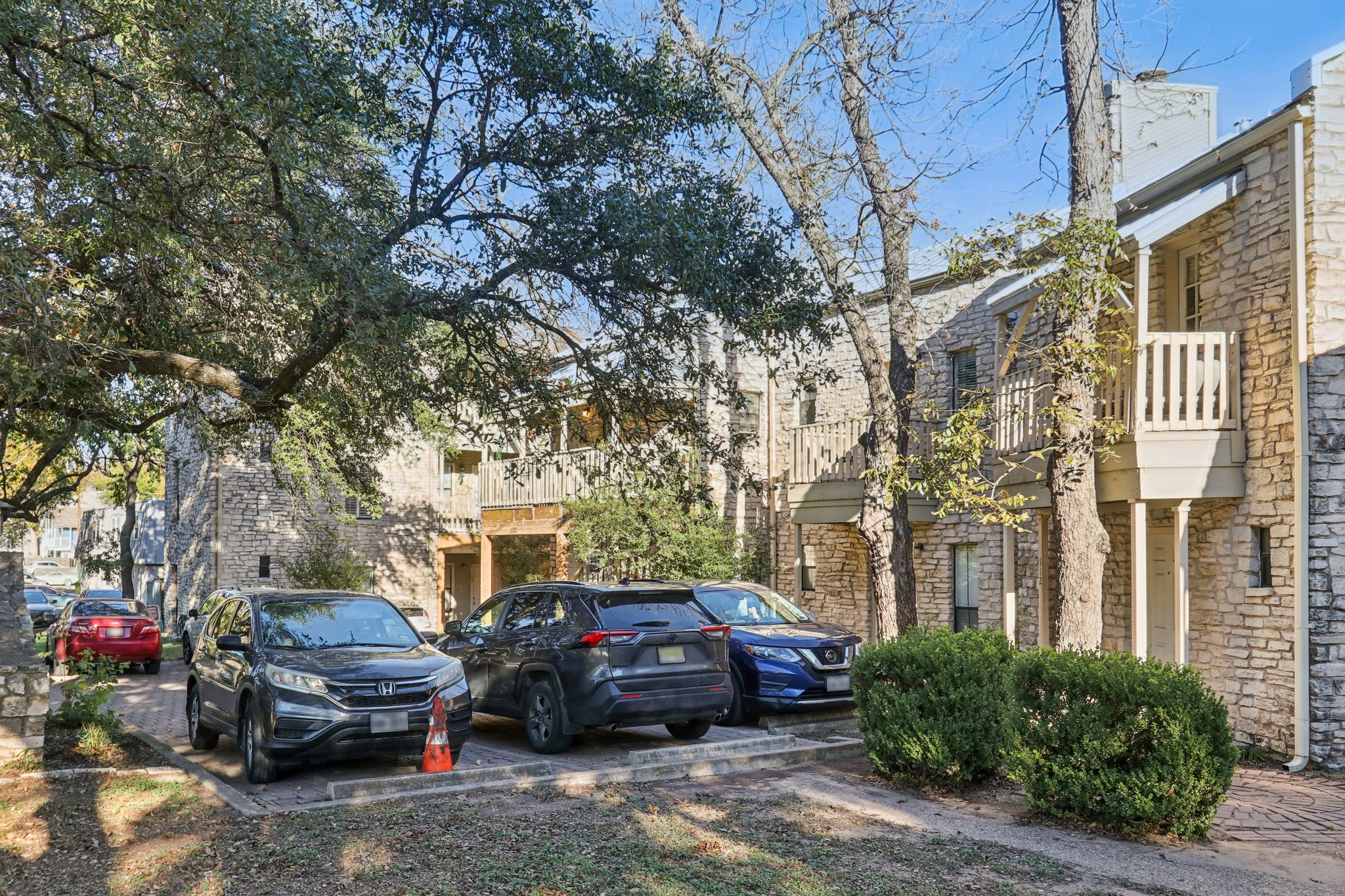 4401 Speedway, Unit 105 Austin, TX 78751 - Photo 10 of 38 The stone exterior and metal roof deliver instant curb appeal and classic Austin character.
