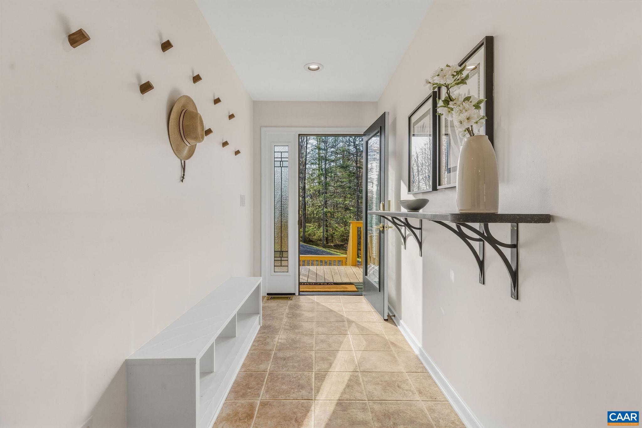 7102 Blackwells Hollow Road Crozet, VA 22932 - Photo 4 of 57 a view of entryway and hall with wooden floor