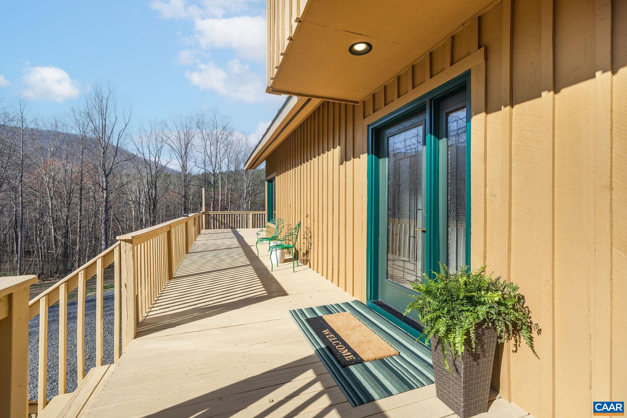 7102 Blackwells Hollow Road Crozet, VA 22932 - Photo 49 of 57 a view of balcony with wooden floor and seating space