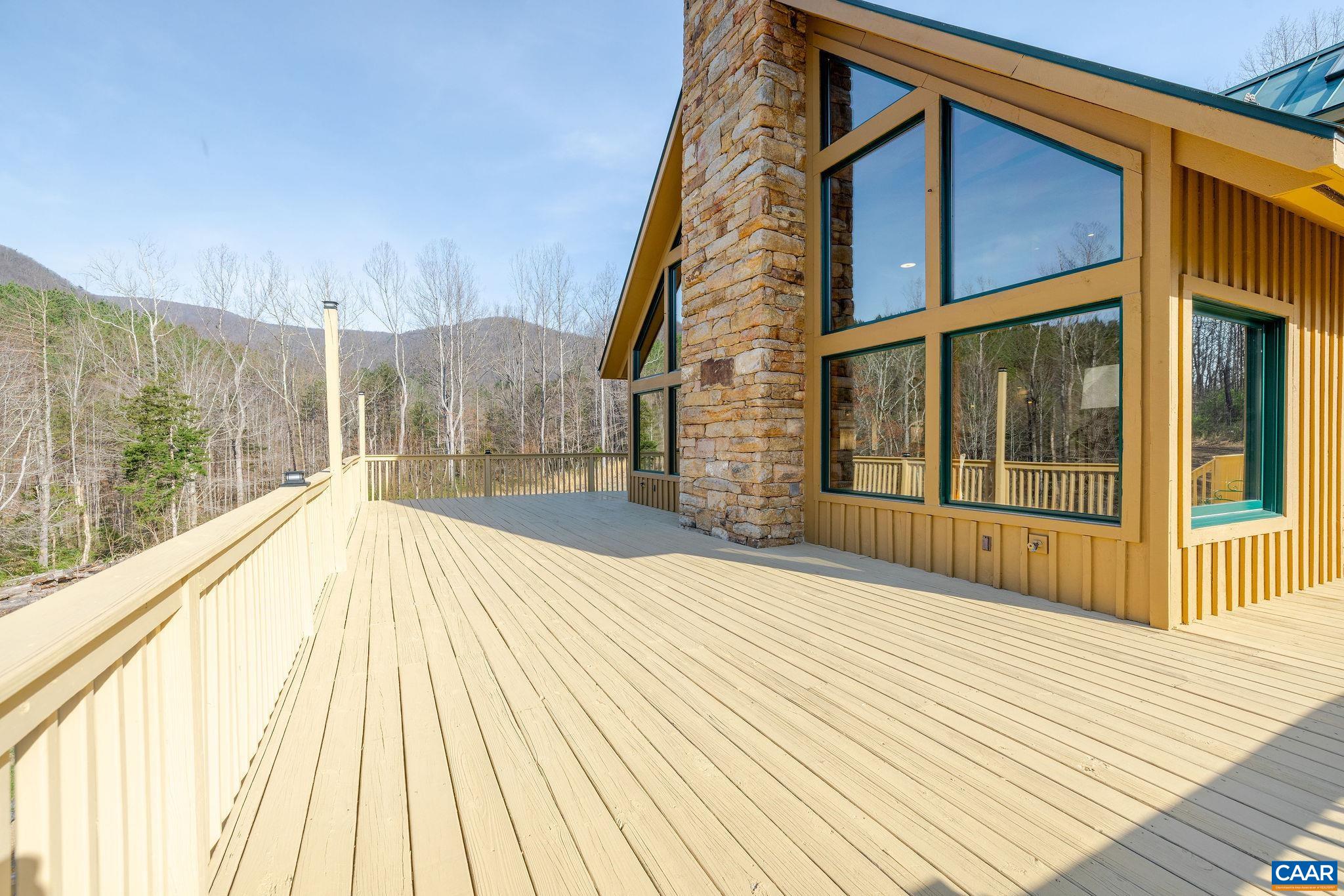 7102 Blackwells Hollow Road Crozet, VA 22932 - Photo 50 of 57 a view of a house with a roof deck