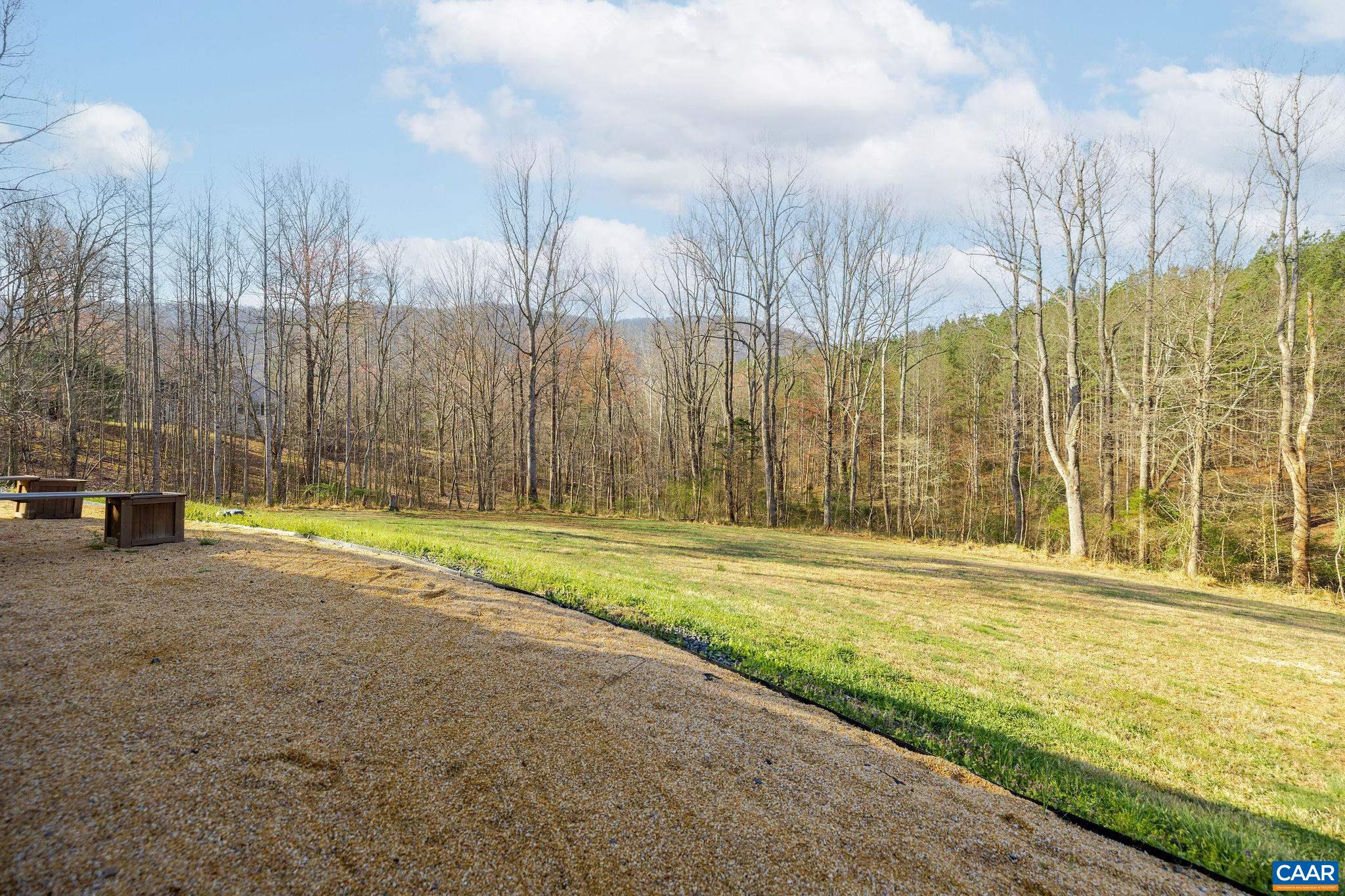 7102 Blackwells Hollow Road Crozet, VA 22932 - Photo 57 of 57 a view of swimming pool with an outdoor space and wooden fence