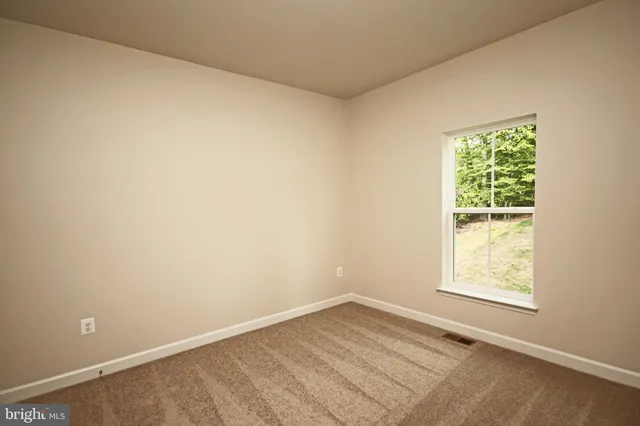 an empty room with window
