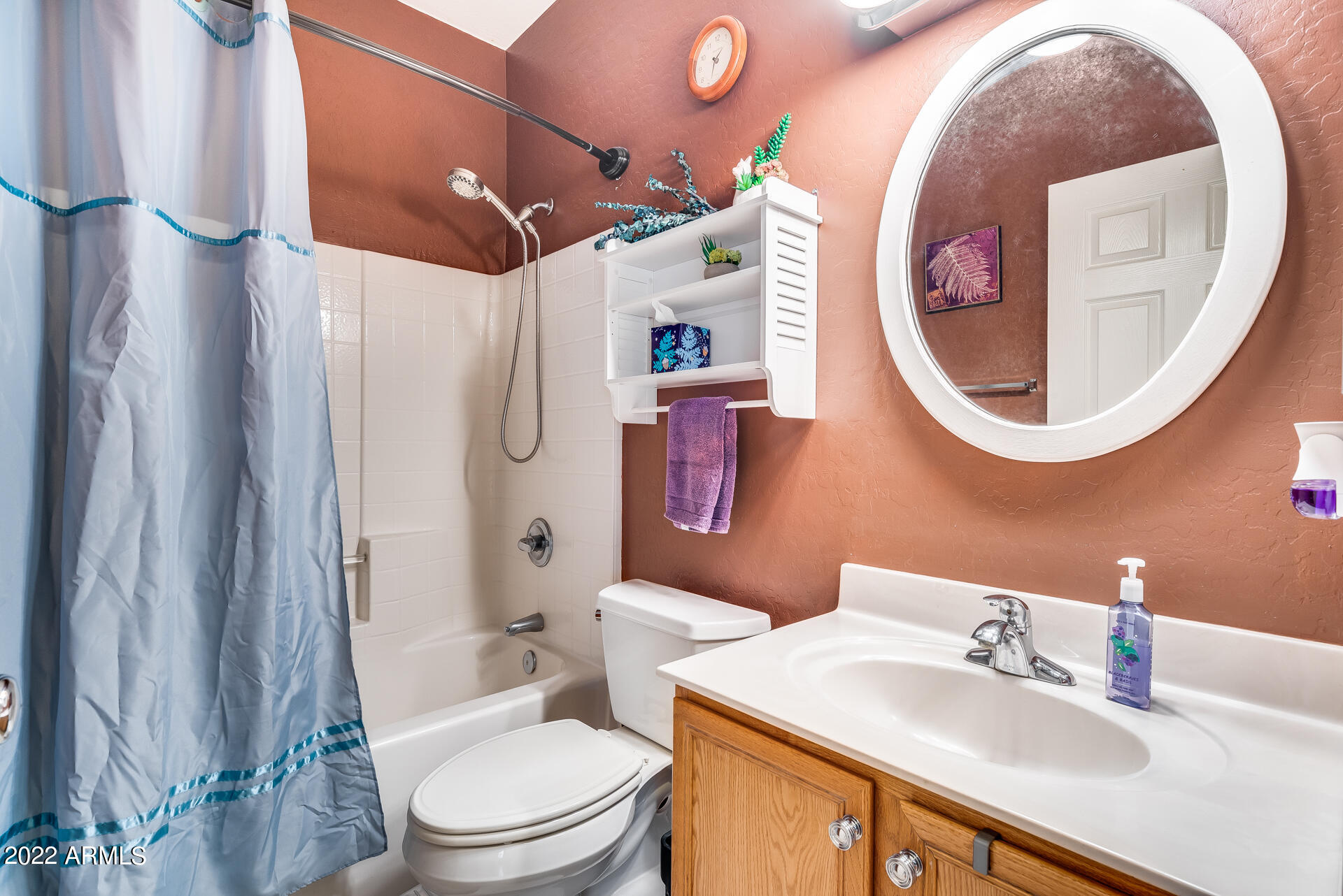 1868 South Rome Street Gilbert, AZ 85295 - Photo 22 of 34 a bathroom with a sink and a mirror