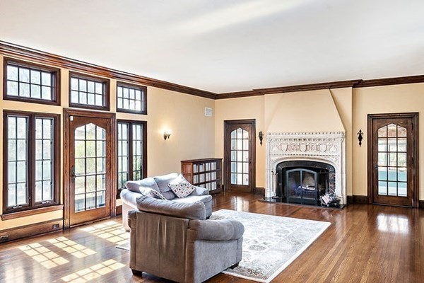 90 Holland Road Brookline, MA 02445 - Photo 12 of 35 a living room with furniture and a fireplace