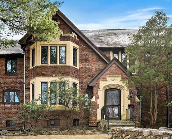 90 Holland Road Brookline, MA 02445 - Photo 2 of 35 a front view of a house with garden