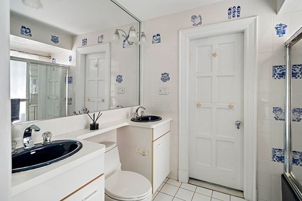 90 Holland Road Brookline, MA 02445 - Photo 31 of 35 a bathroom with a sink toilet and shower