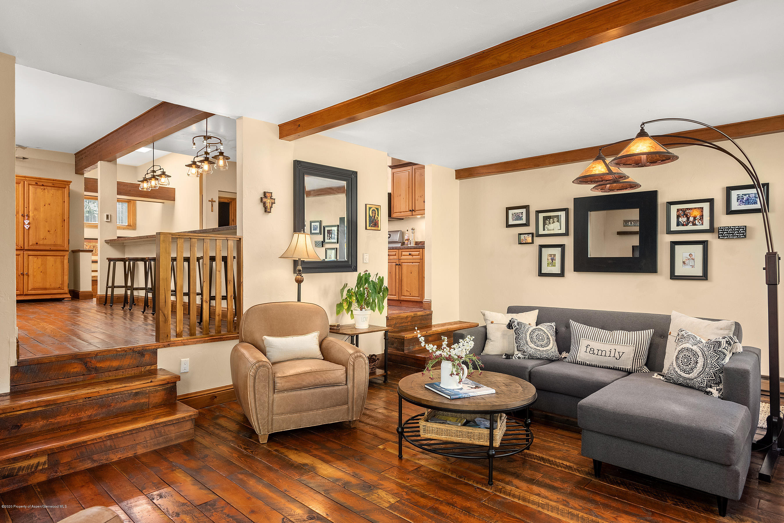 222 Meadow Ranch Road, Unit D4B Snowmass Village, CO 81615 - Photo 3 of 26 a living room with furniture and a wooden floor