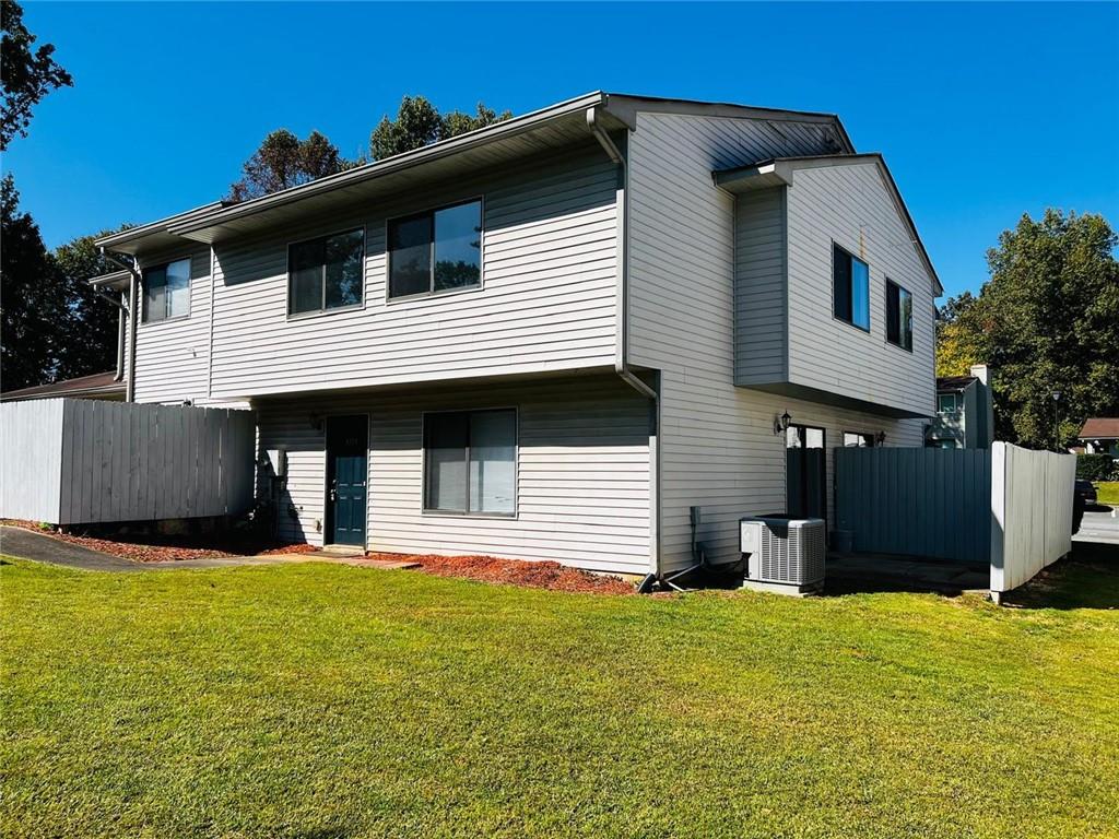 3759 Mulkey Circle Southwest Marietta, GA 30008 - Photo 1 of 22 a front view of a house with a yard