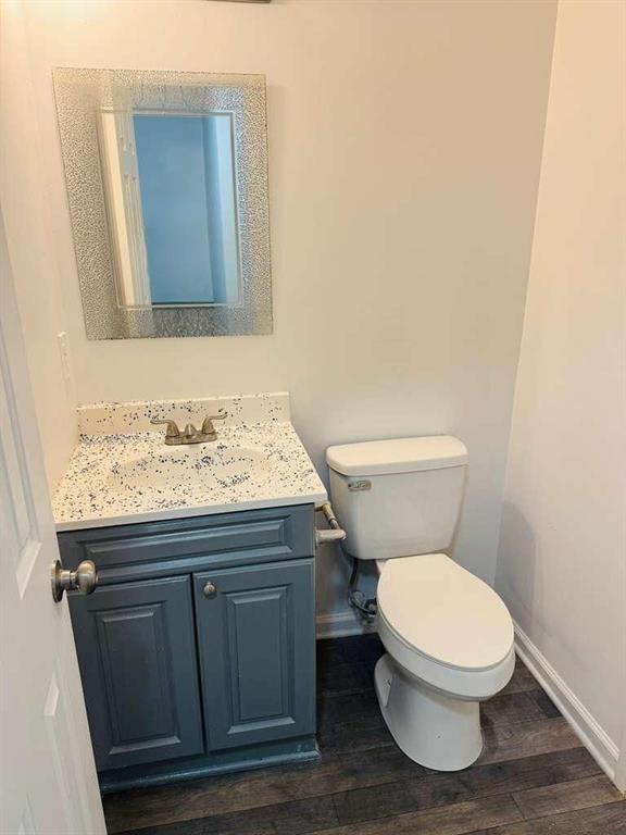 3759 Mulkey Circle Southwest Marietta, GA 30008 - Photo 10 of 22 a white toilet sitting next to a bathroom sink