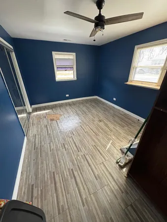 a bathroom with a tub and a shower