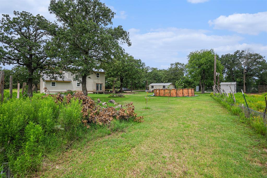 150 County 2110 Road Whitney, TX 76692 - Photo 20 of 21 a view of yard with swimming pool and green space