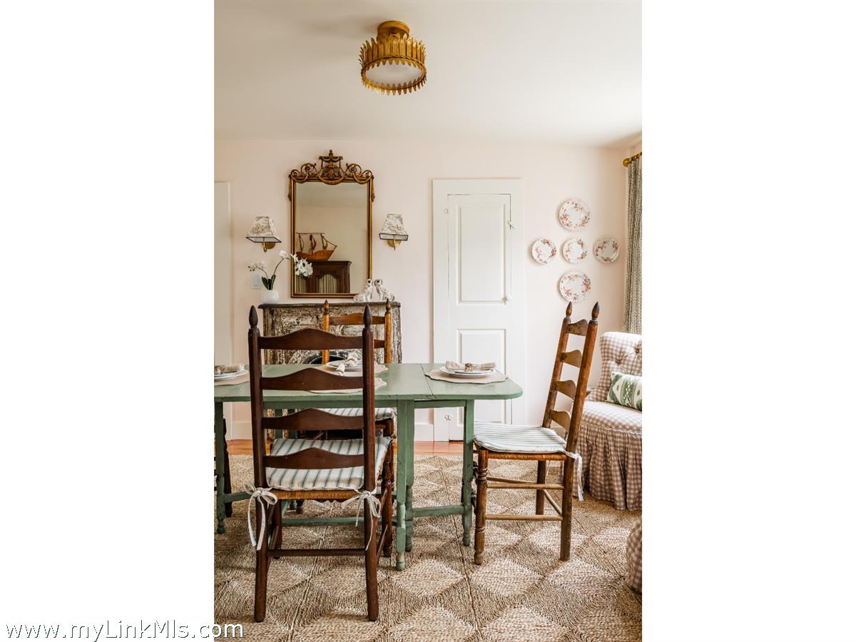 10 Centre Street Nantucket, MA 02554 - Photo 11 of 43 a view of a room with a table and chairs