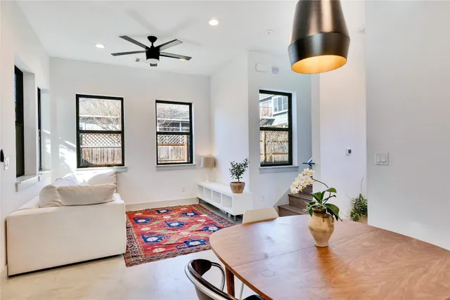 a living room with furniture and window