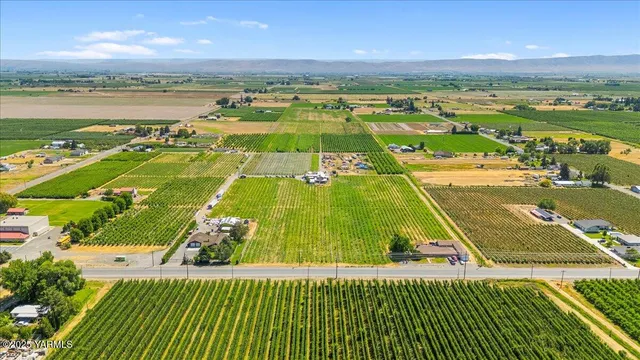 a view of a swimming pool and an outdoor space