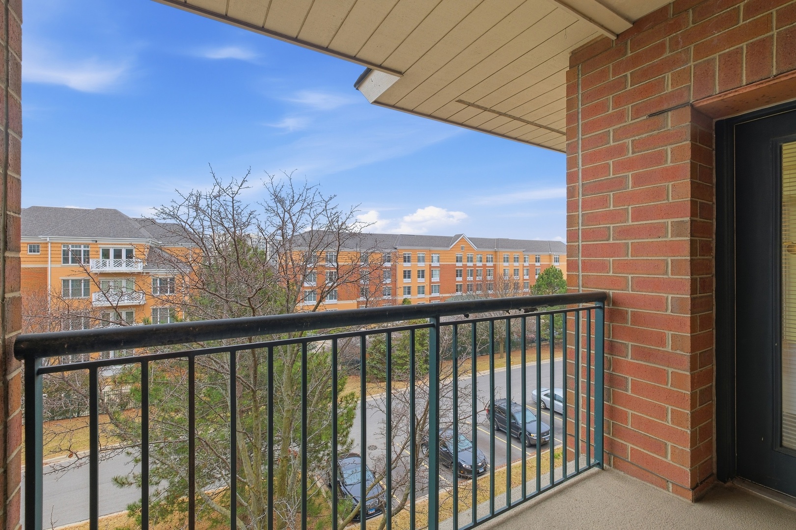 875 East 22nd Street, Unit 410 Lombard, IL 60148 - Photo 12 of 30 a view of city from a balcony