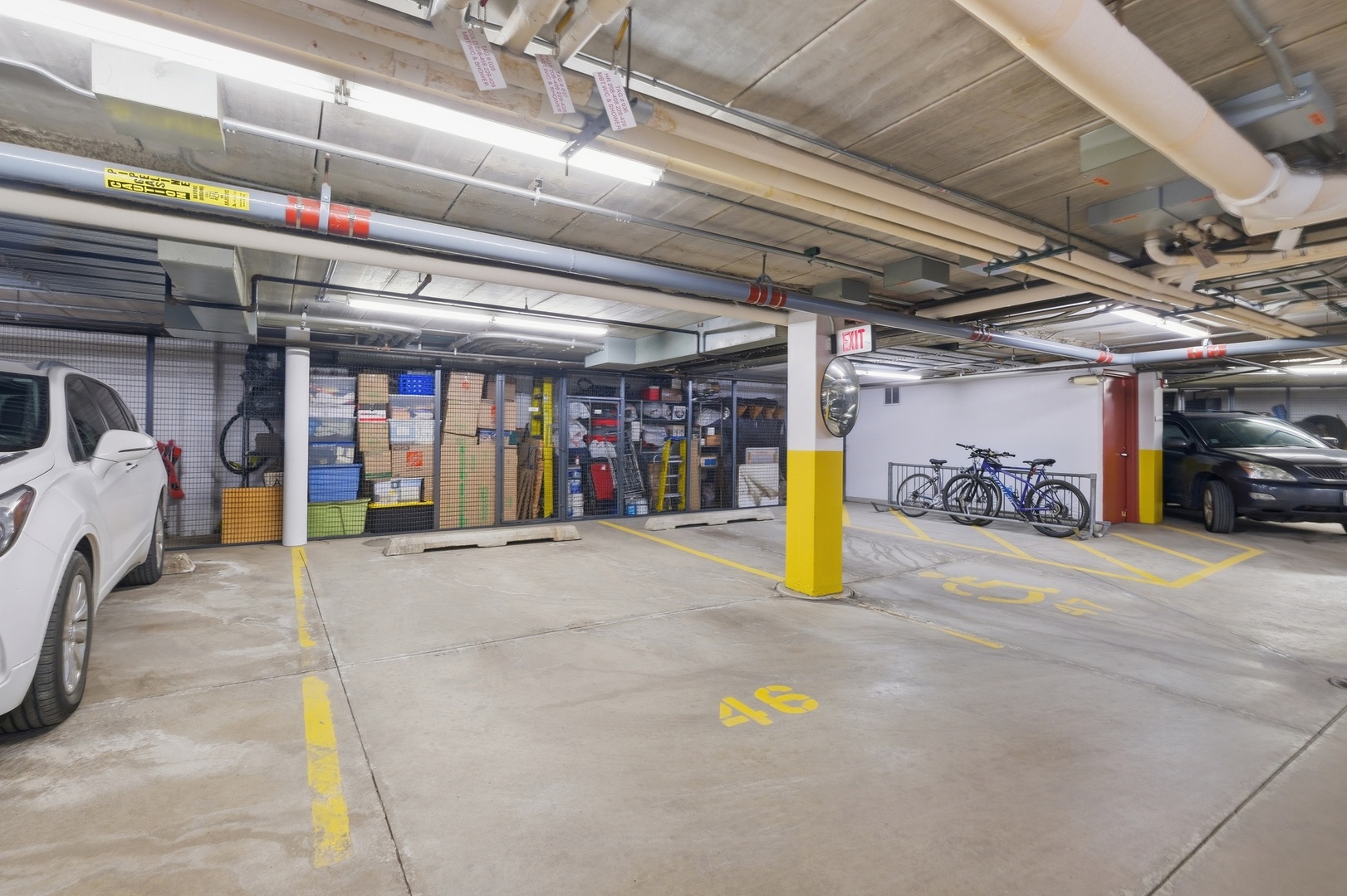 875 East 22nd Street, Unit 410 Lombard, IL 60148 - Photo 22 of 30 a view of parking garage with cars