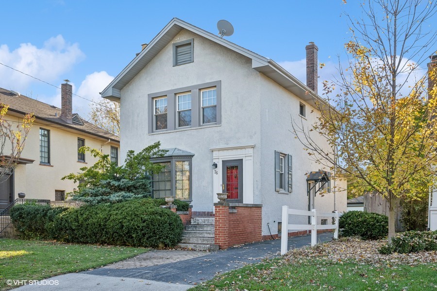 76 Warwick Road Winnetka, IL 60093 - Photo 1 of 8 a view of a house with backyard and garden