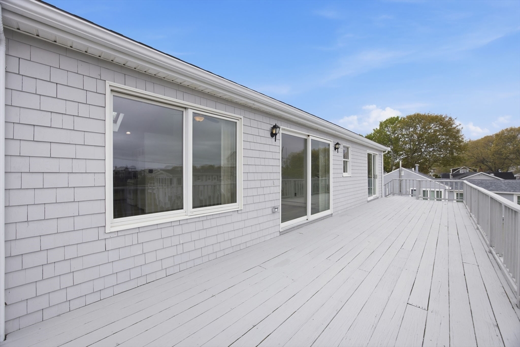 192 Swifts Beach Road Wareham, MA 02571 - Photo 12 of 38 a view of a house with a balcony