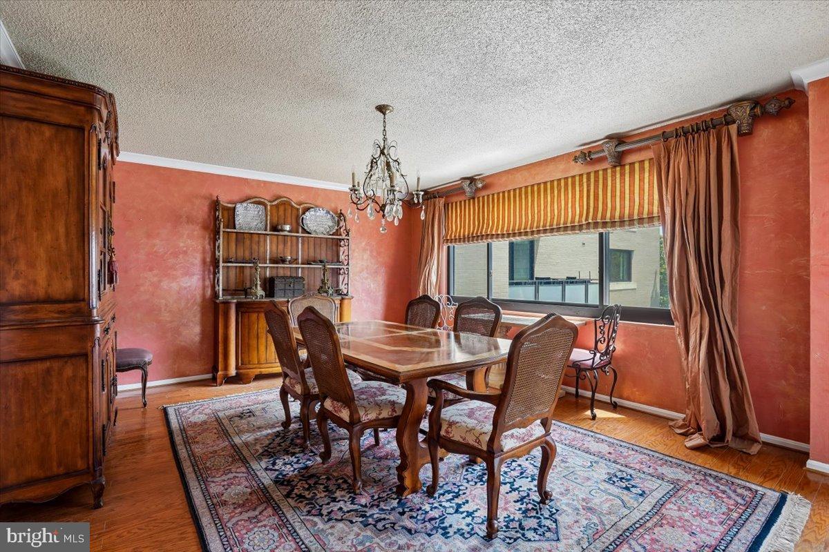 800 25th Street Northwest, Unit 504 Washington, DC 20037 - Photo 14 of 52 Elegant dining space with warm hues.